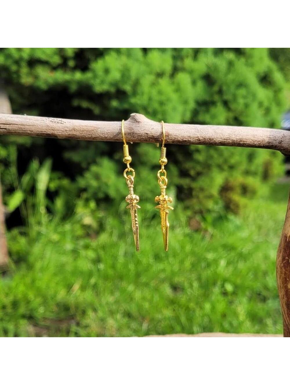 Gold sword of light earrings. 🗡✨️